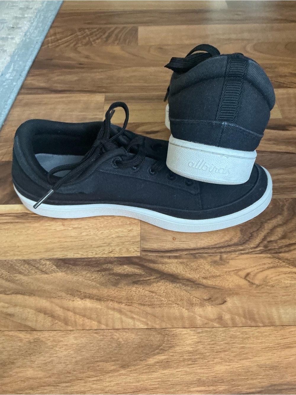 allbirds women’s Black Canvas Sneakers with White Sole